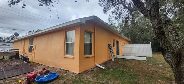 a house with trees in front of it