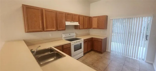 a utility room with cabinets