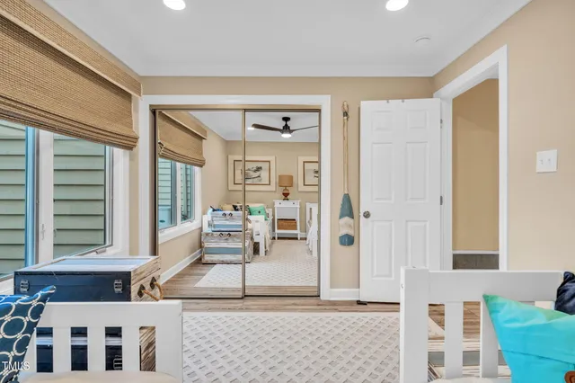 a living room with furniture and a window