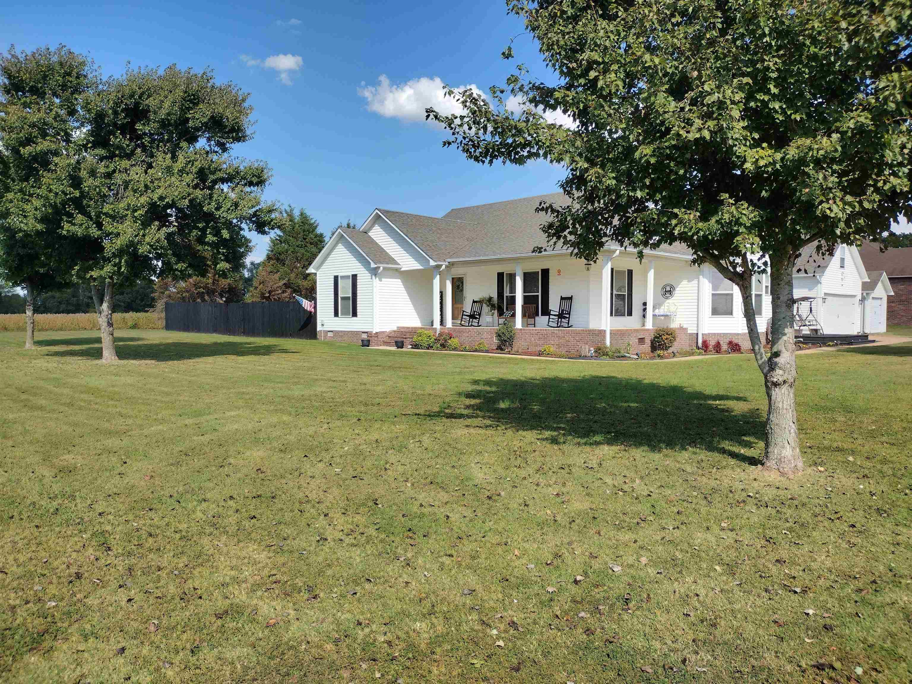 360 Parham Road Martin, TN 38237 - Photo 1 of 32 a front view of a house with a yard