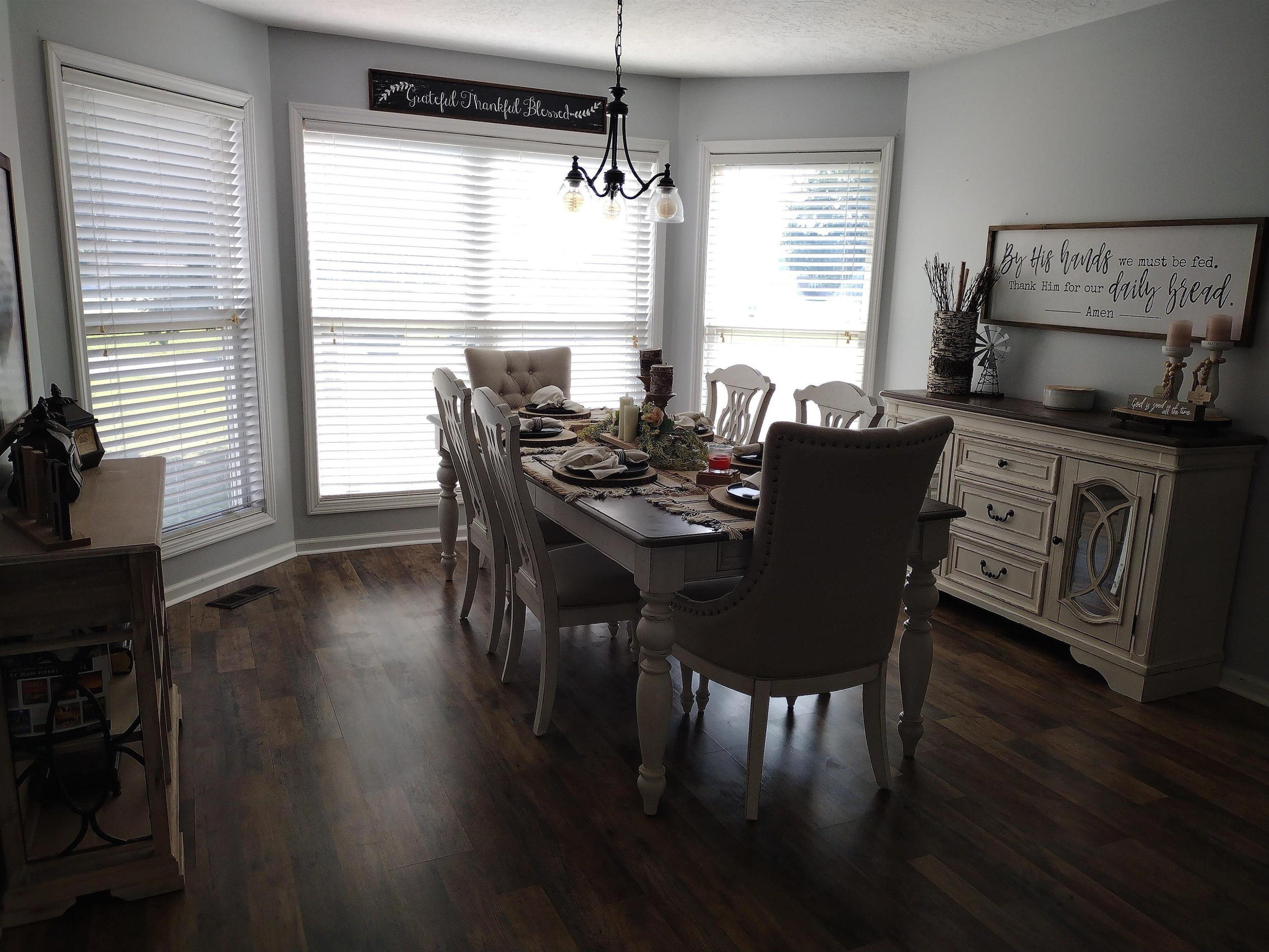 360 Parham Road Martin, TN 38237 - Photo 19 of 32 a view of a dining room with furniture window and wooden floor