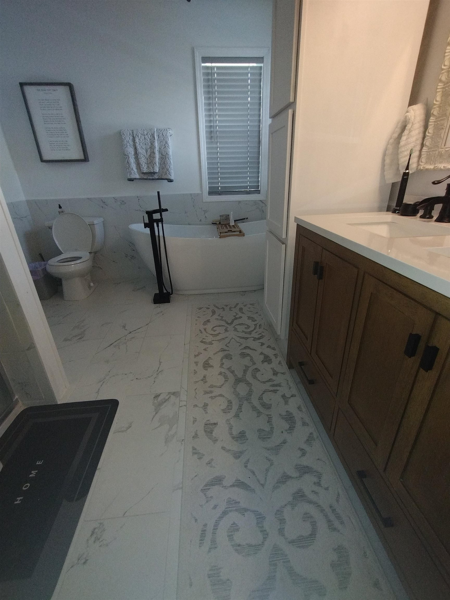 360 Parham Road Martin, TN 38237 - Photo 24 of 32 a bathroom with a sink a toilet and mirror