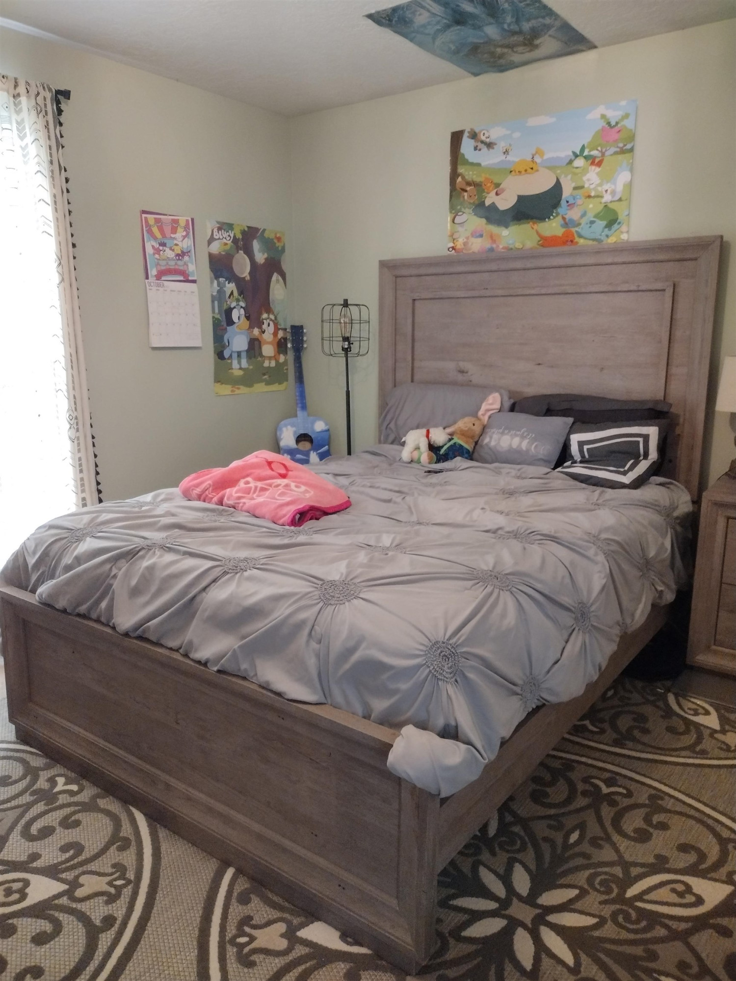 360 Parham Road Martin, TN 38237 - Photo 30 of 32 a bedroom with a bed and painting on the wall