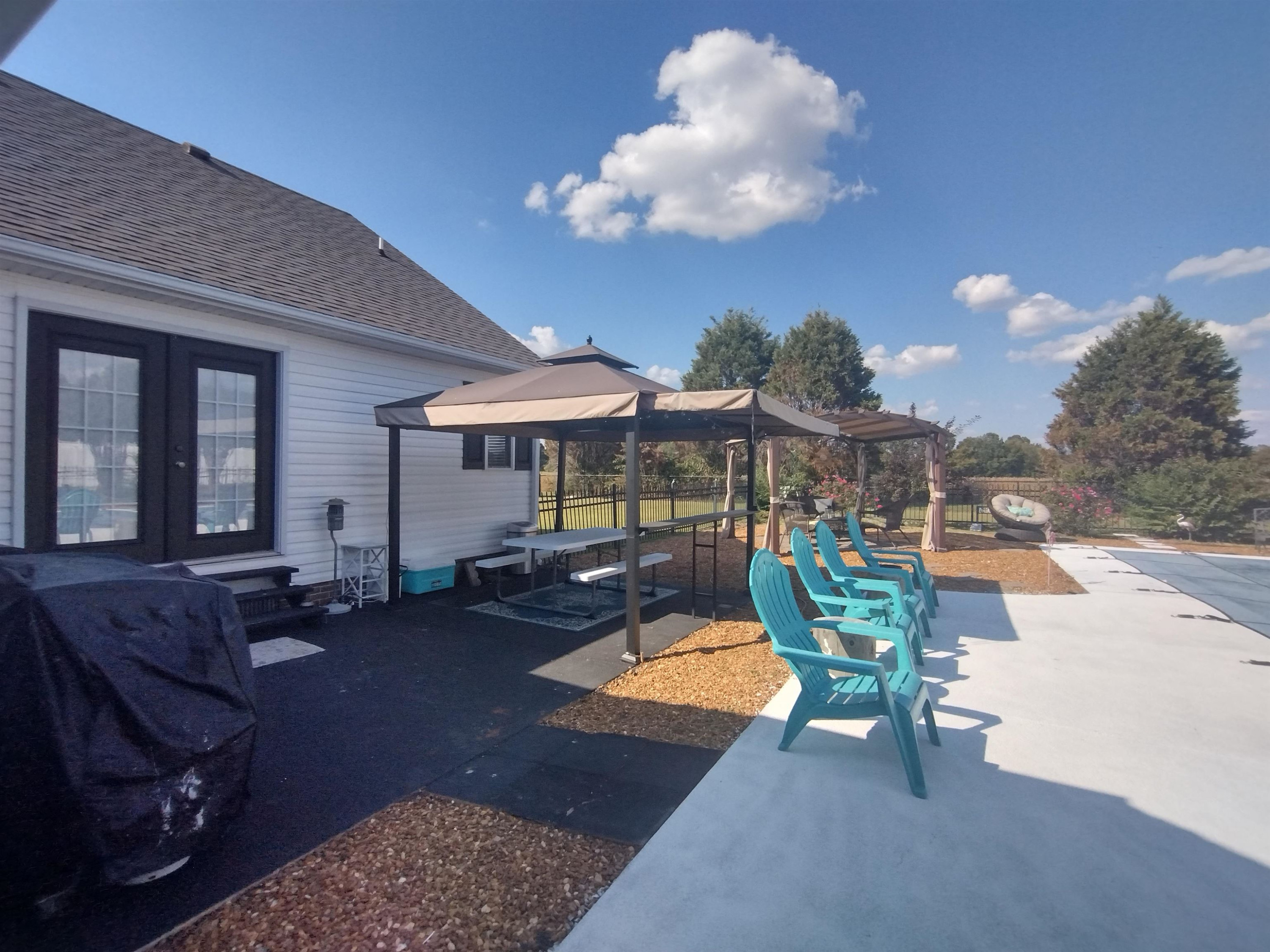 360 Parham Road Martin, TN 38237 - Photo 7 of 32 a view of a house with backyard porch and sitting area