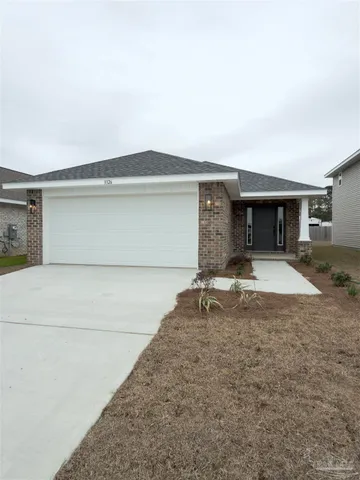 a living room with stainless steel appliances kitchen island granite countertop a sink and cabinets