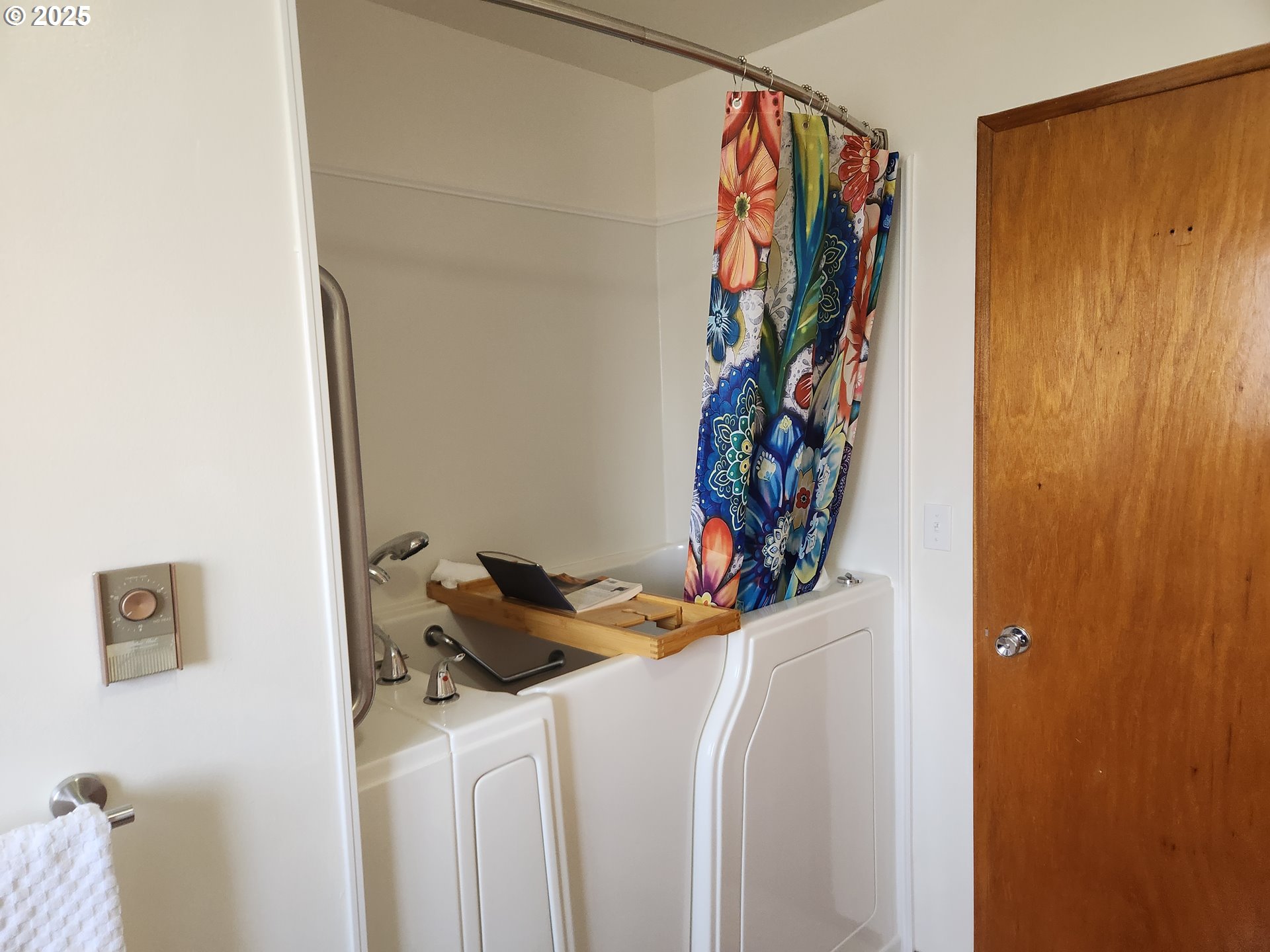 2207 Oregon Court Woodburn, OR 97071 - Photo 11 of 27 a view of a closet with storage