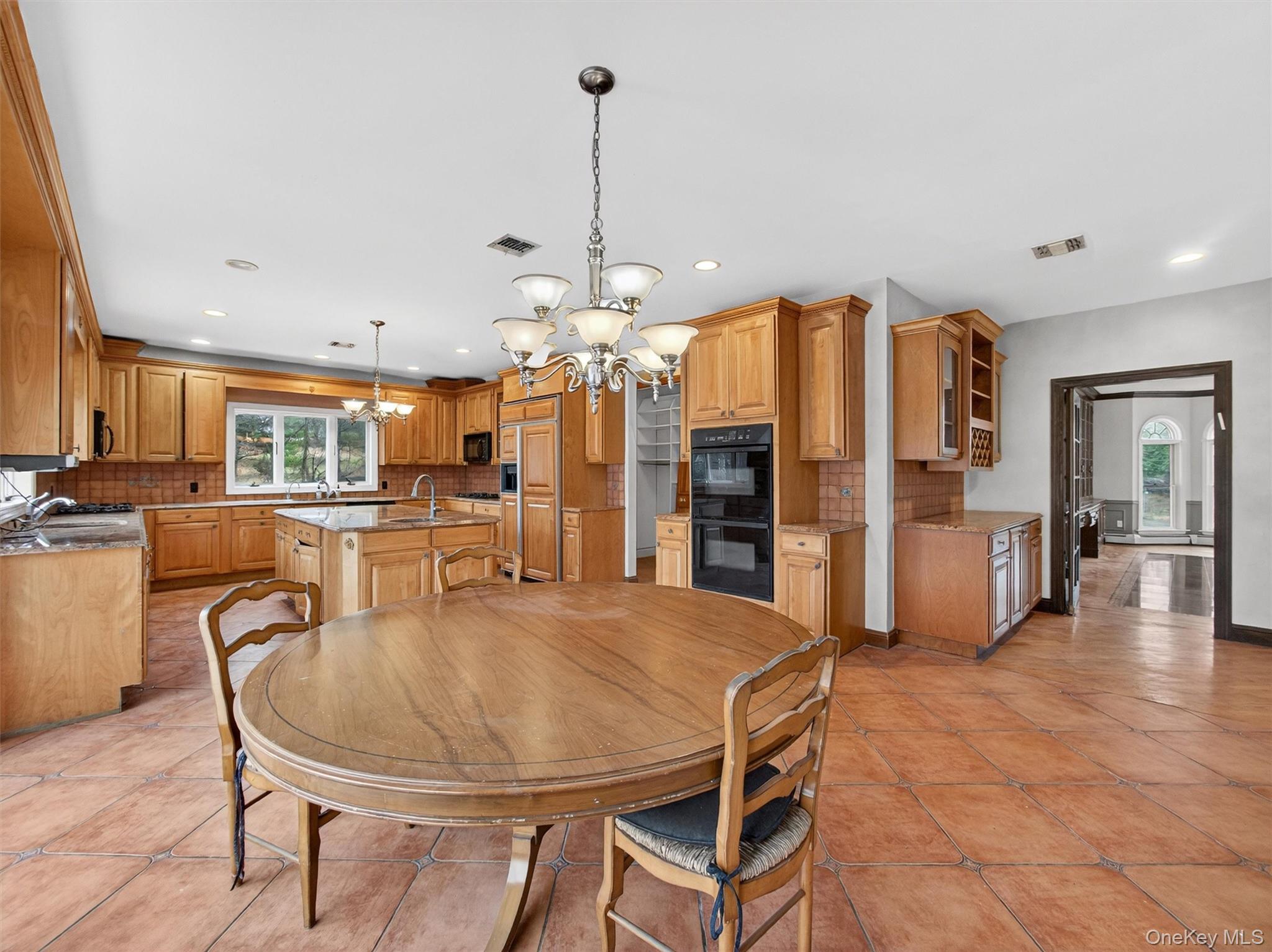 120 East Willow Tree Road Spring Valley, NY 10977 - Photo 12 of 49 Dining space with a chandelier and recessed lighting