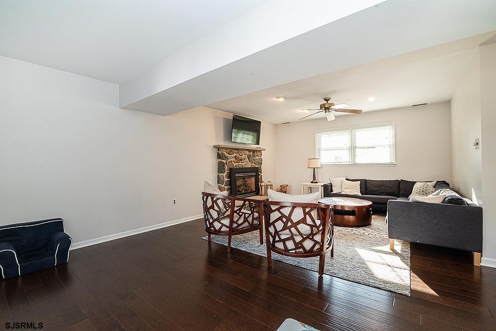 68 Defeo Lane Somers Point, NJ 08244 - Photo 17 of 44 a living room with furniture and wooden floor