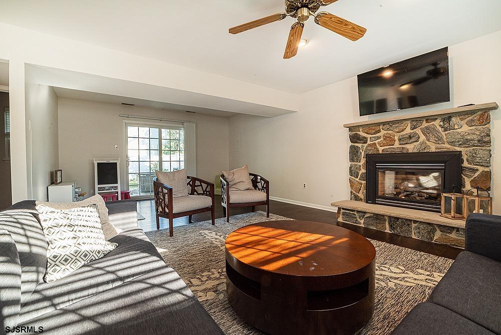 68 Defeo Lane Somers Point, NJ 08244 - Photo 19 of 44 a living room with furniture and a fireplace