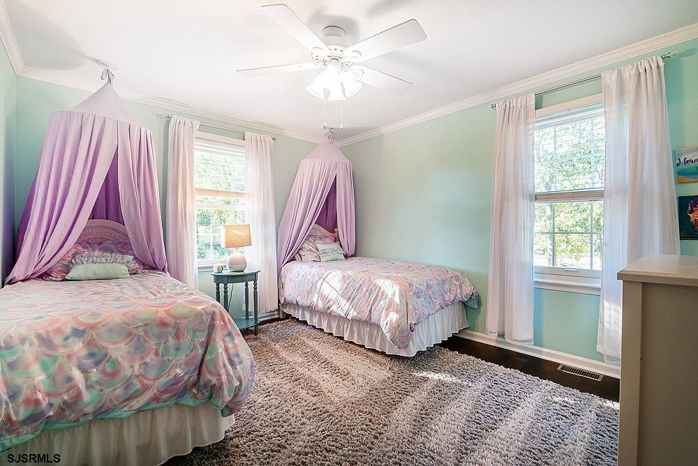 68 Defeo Lane Somers Point, NJ 08244 - Photo 25 of 44 a bedroom with two beds and a window