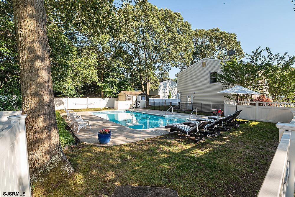 68 Defeo Lane Somers Point, NJ 08244 - Photo 37 of 44 a view of a backyard with sitting area
