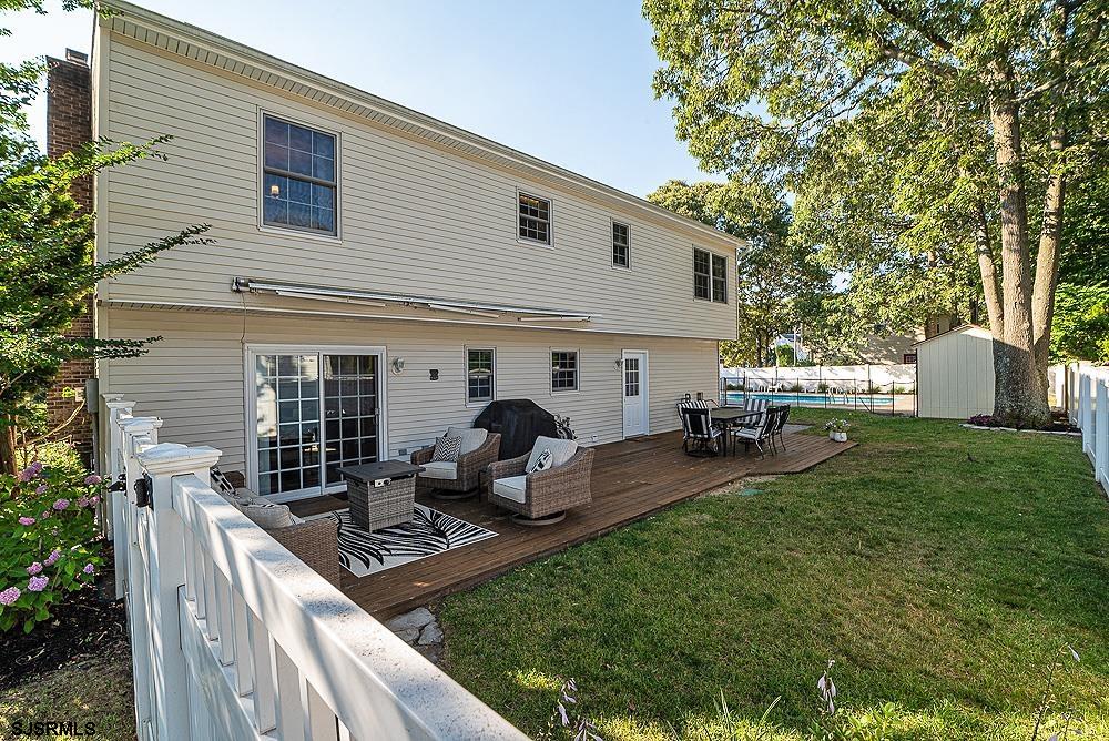 68 Defeo Lane Somers Point, NJ 08244 - Photo 40 of 44 a view of a house with backyard and sitting area