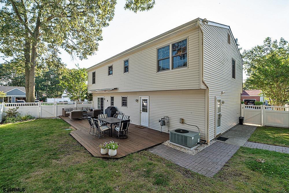 68 Defeo Lane Somers Point, NJ 08244 - Photo 44 of 44 a view of a house with backyard porch and sitting area