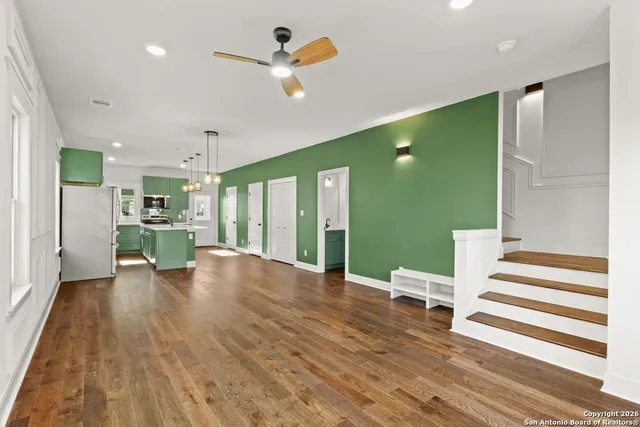 a view of a living room and entryway