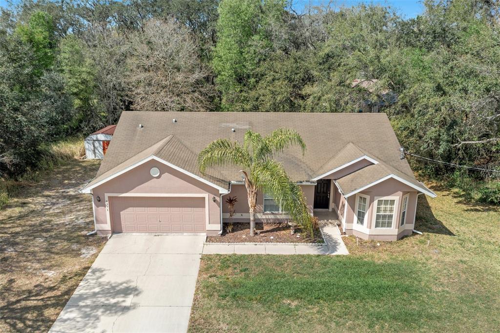 8371 Gallup Road Spring Hill, FL 34608 - Photo 1 of 1 aerial view of a house with a yard