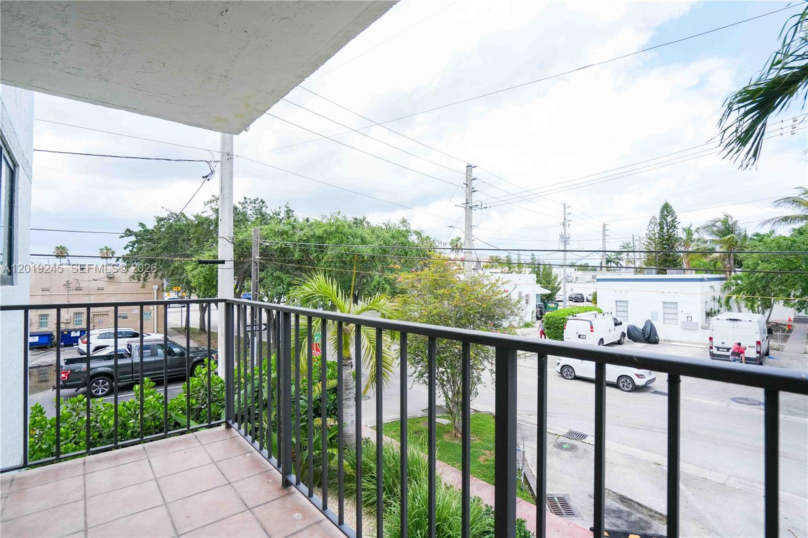 6960 Rue Vendome, Unit 201 Miami Beach, FL 33141 - Photo 19 of 27 a view of a balcony with wooden floor