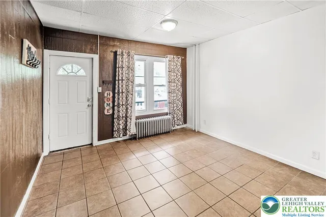 a view of an entryway with stairs