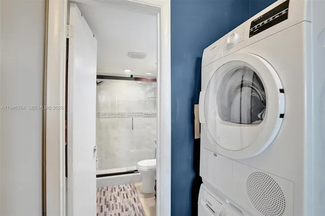 a bathroom with a toilet and a sink