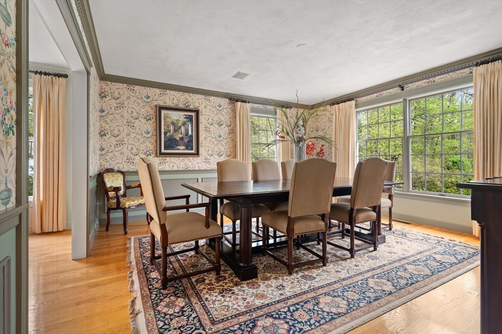 37 Old Planters Road Beverly, MA 01915 - Photo 9 of 42 a view of a dining room with furniture window and wooden floor