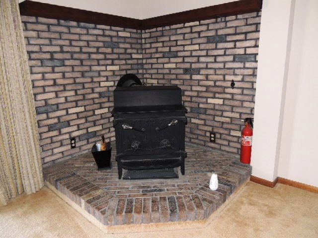 5642 Spring Brook Road Rockford, IL 61114 - Photo 15 of 25 a view of a fireplace