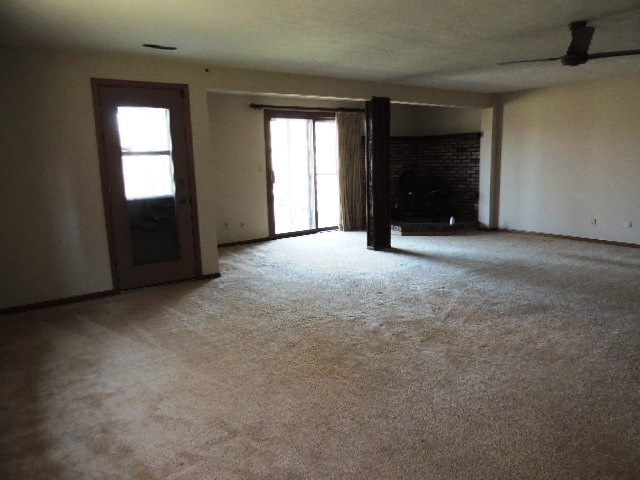 5642 Spring Brook Road Rockford, IL 61114 - Photo 16 of 25 an empty room with windows and closet