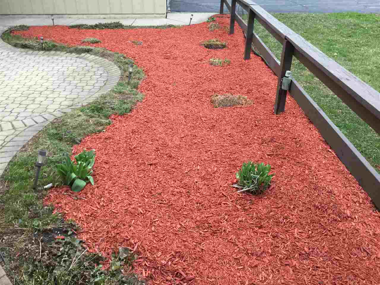 5642 Spring Brook Road Rockford, IL 61114 - Photo 21 of 25 a view of a pathway with a flower garden