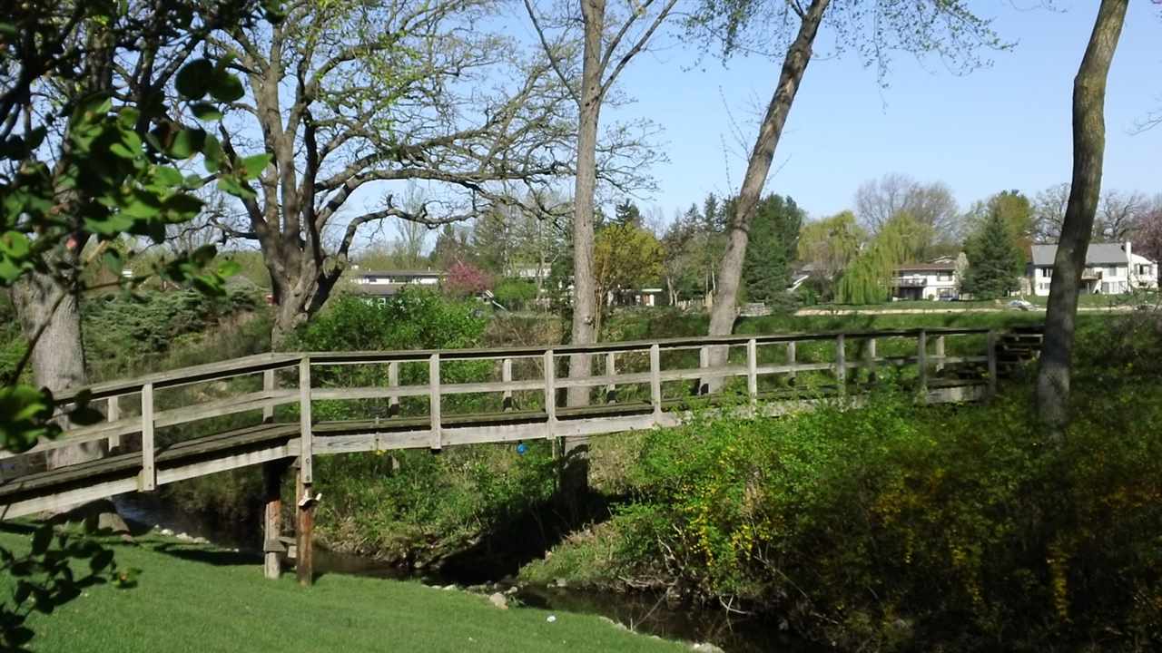 5642 Spring Brook Road Rockford, IL 61114 - Photo 3 of 25 a view of a backyard with garden