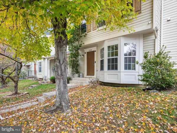 a house with trees in front of it