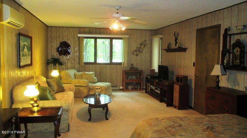 804 Rodeo Court Hawley, PA 18428 - Photo 7 of 37 a living room with furniture window and a table