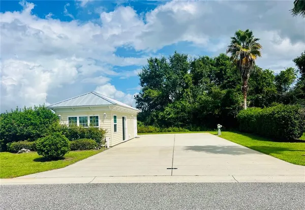a house with yard in front of it