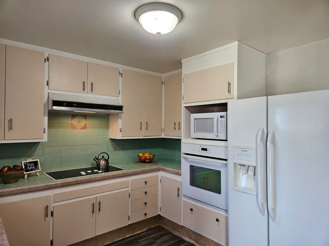 a bathroom with a shower and a toilet