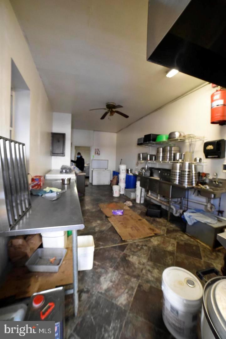 402 Long Lane Upper Darby, PA 19082 - Photo 4 of 7 a gym area with lots of furniture and clutter