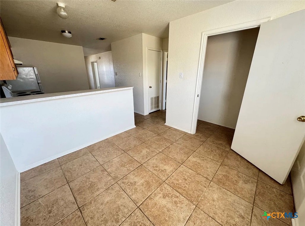 3404 Zephyr Road Killeen, TX 76543 - Photo 7 of 10 a view of a big room with closet and windows