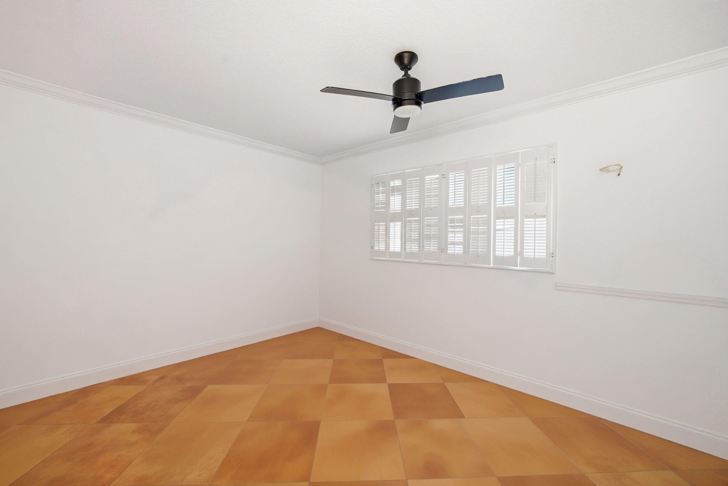 375 Northwest 53rd Street Boca Raton, FL 33487 - Photo 12 of 14 wooden floor in an empty room