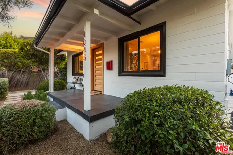 a view of a couches in front of house