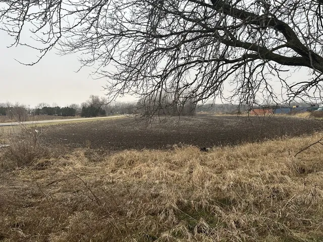 a view of lake with green space
