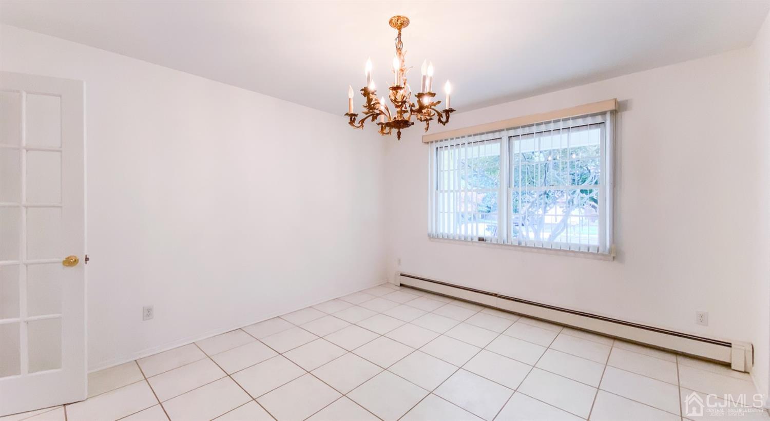 31 Lynnwood Road Edison, NJ 08820 - Photo 8 of 18 a view of a room with window