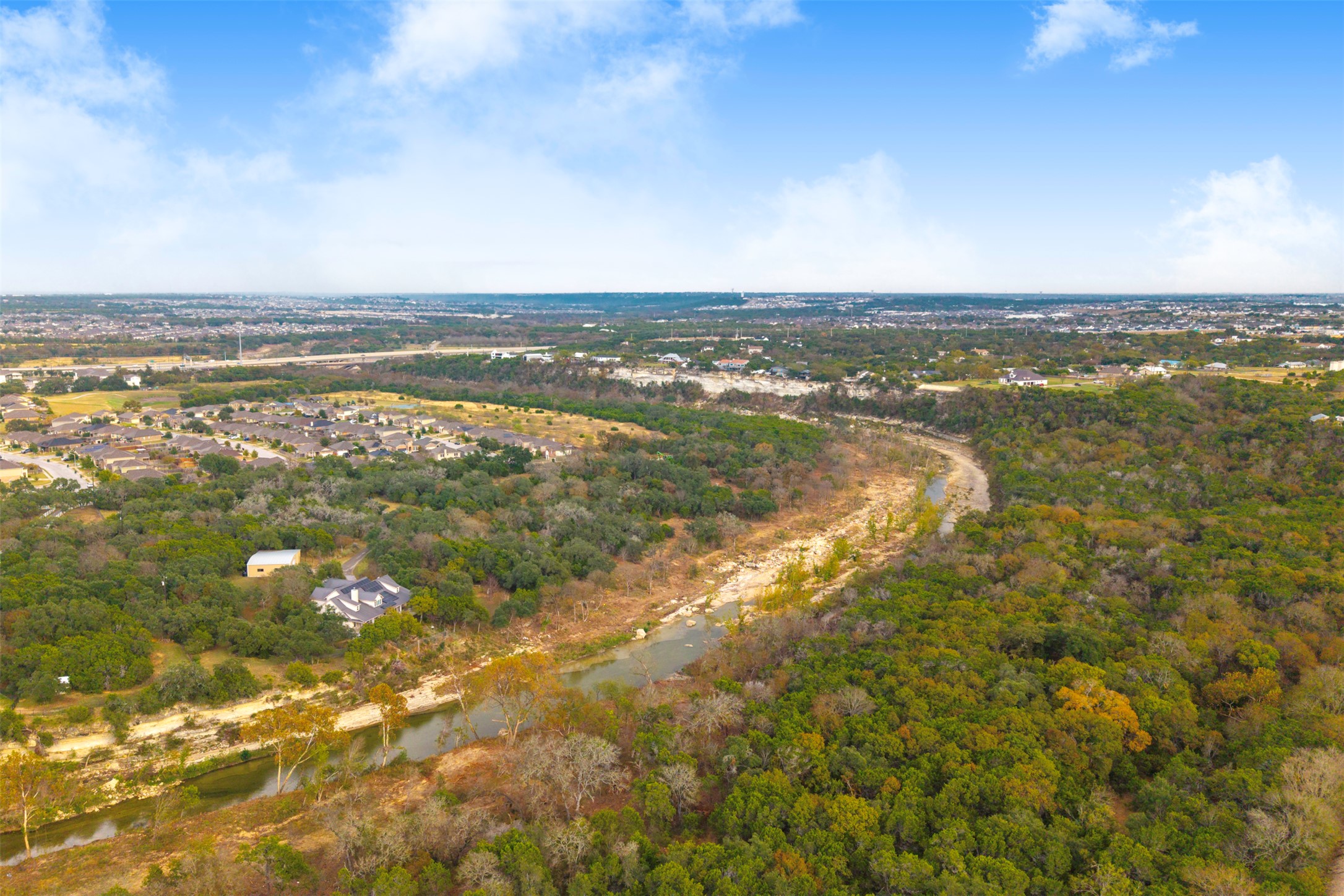 0 River Run Leander, TX 78641 - Photo 20 of 34 a view of a city with an ocean