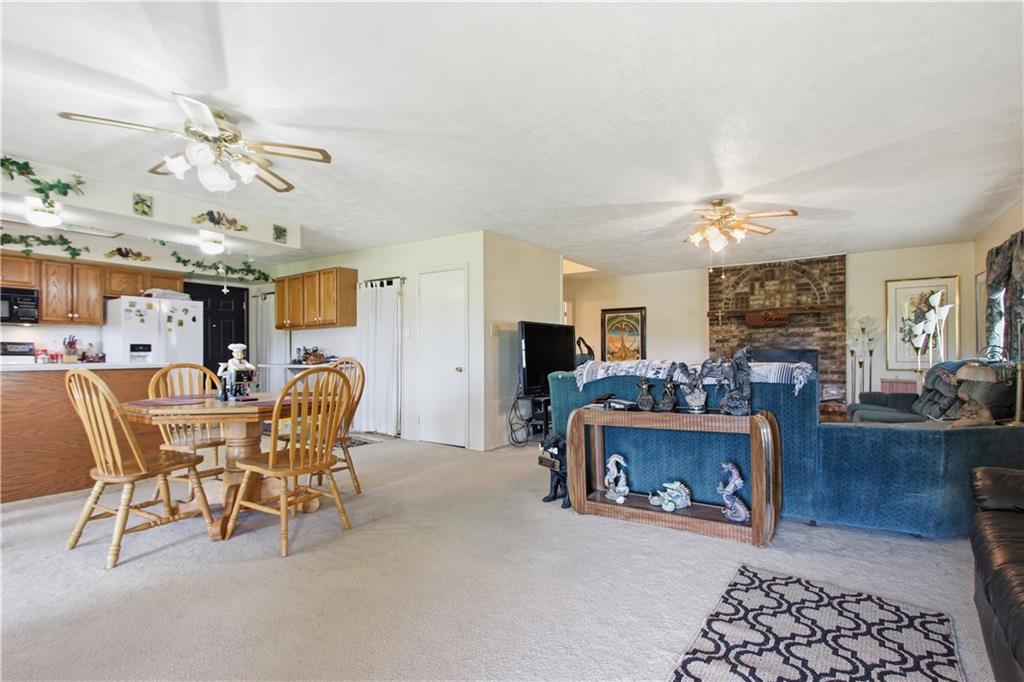 776 Fraction Road West Finley, PA 15377 - Photo 11 of 43 a view of a dining room with furniture and chandelier