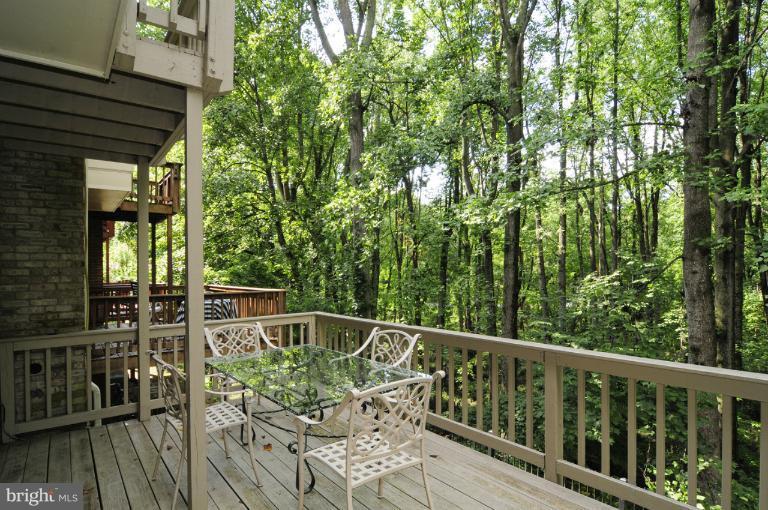 7841 Oracle Place Potomac, MD 20854 - Photo 18 of 29 a view of balcony with furniture and wooden deck