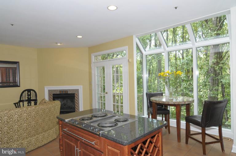 7841 Oracle Place Potomac, MD 20854 - Photo 19 of 29 a kitchen that has a table and chairs in it
