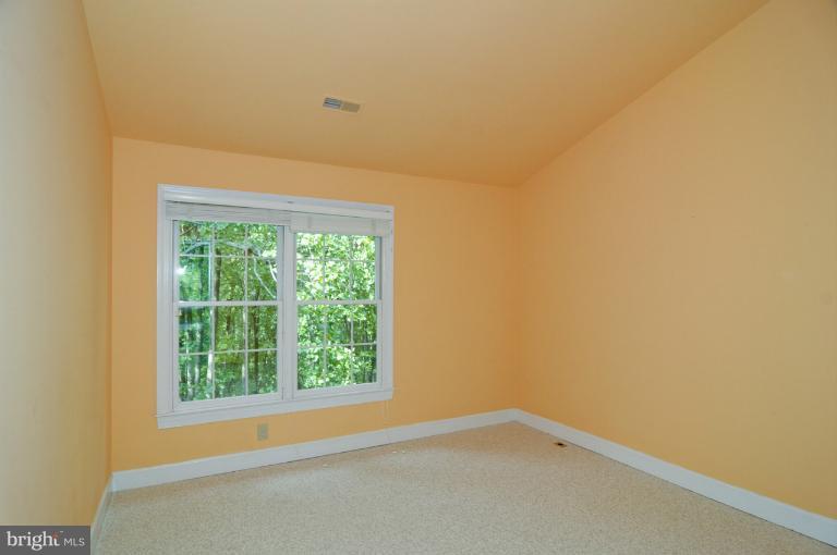7841 Oracle Place Potomac, MD 20854 - Photo 27 of 29 a view of an empty room with a window