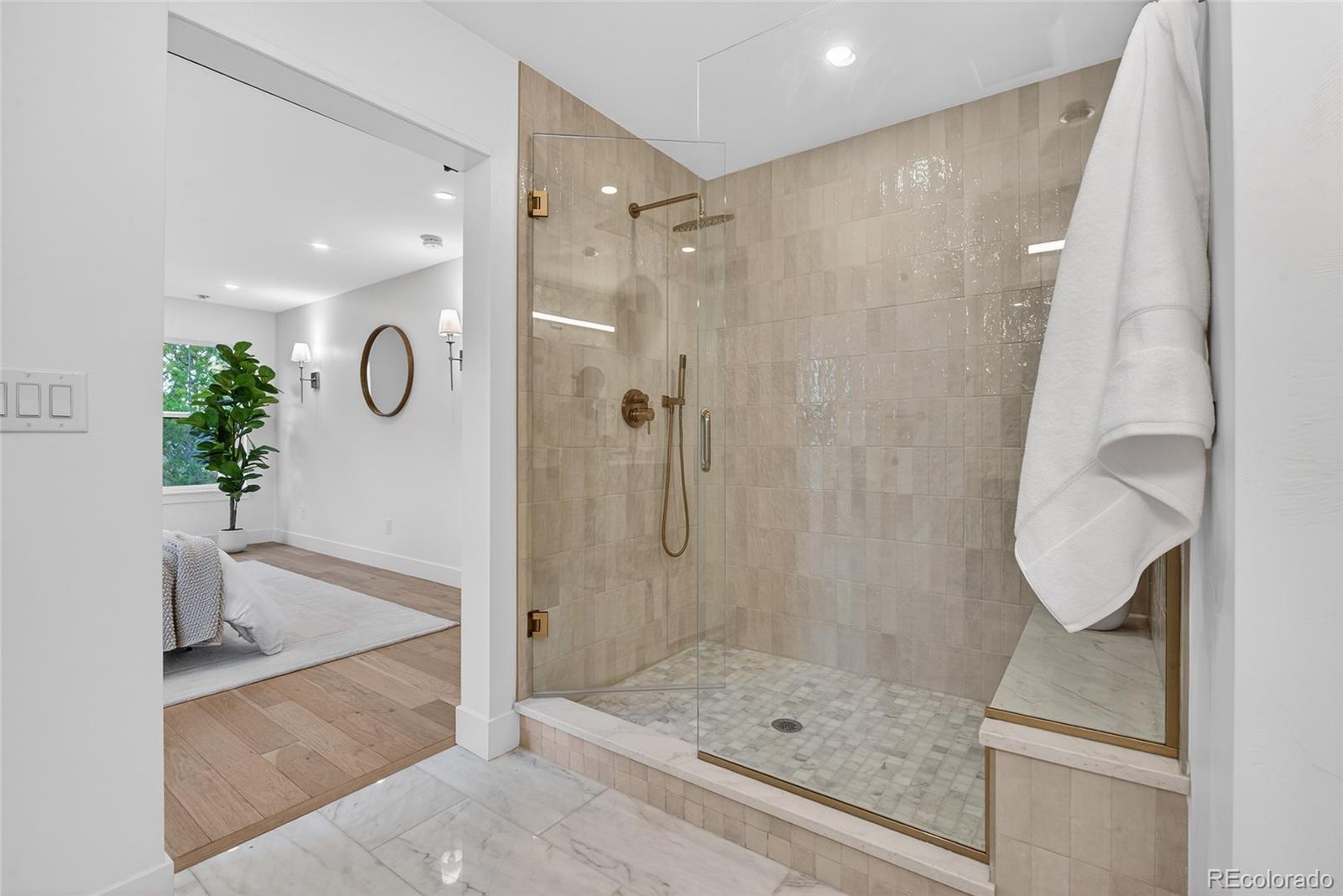 2362 South Acoma Street Denver, CO 80223 - Photo 27 of 50 a bathroom with a shower and a sink