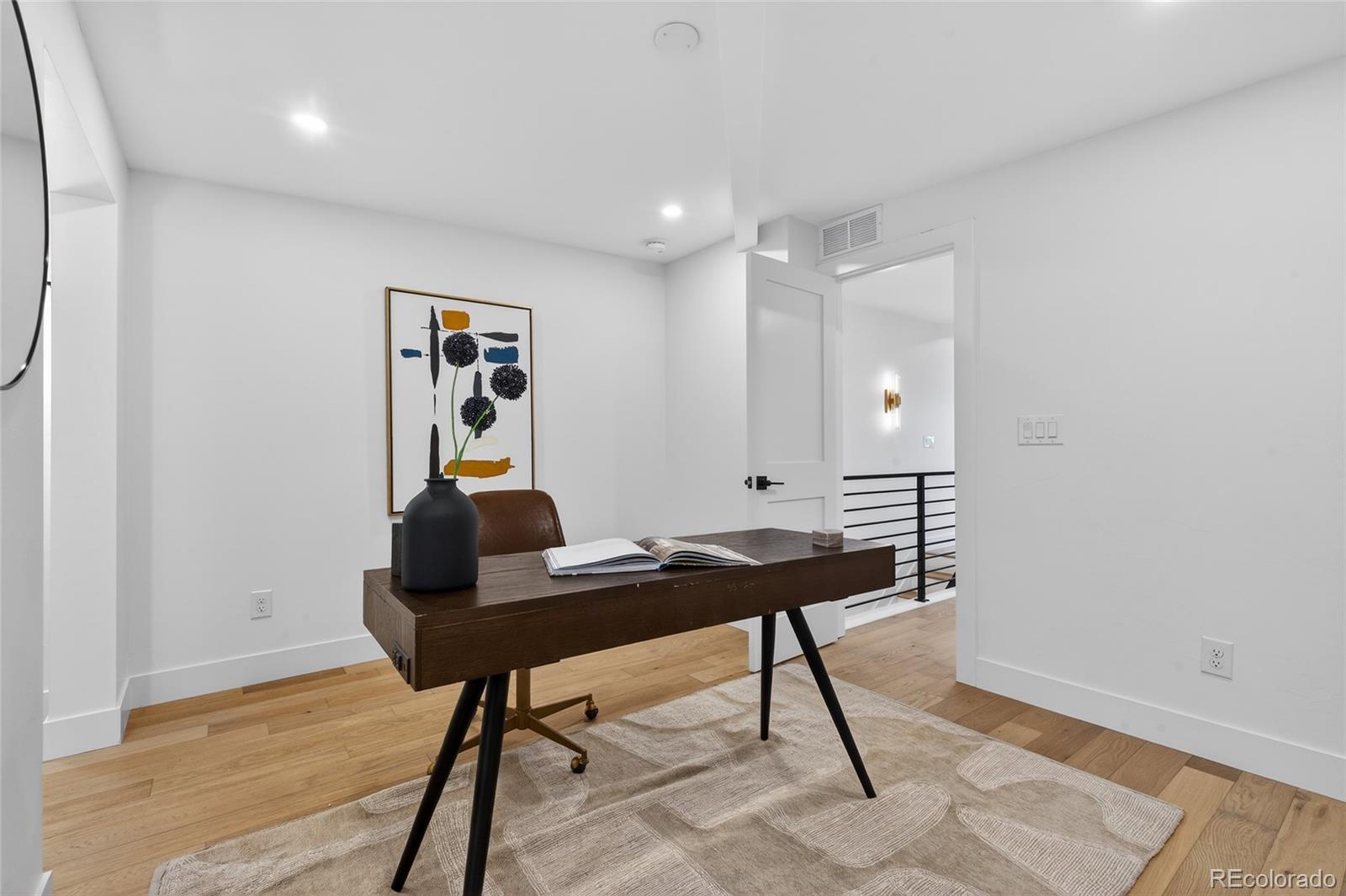 2362 South Acoma Street Denver, CO 80223 - Photo 40 of 50 a view of a workspace with furniture