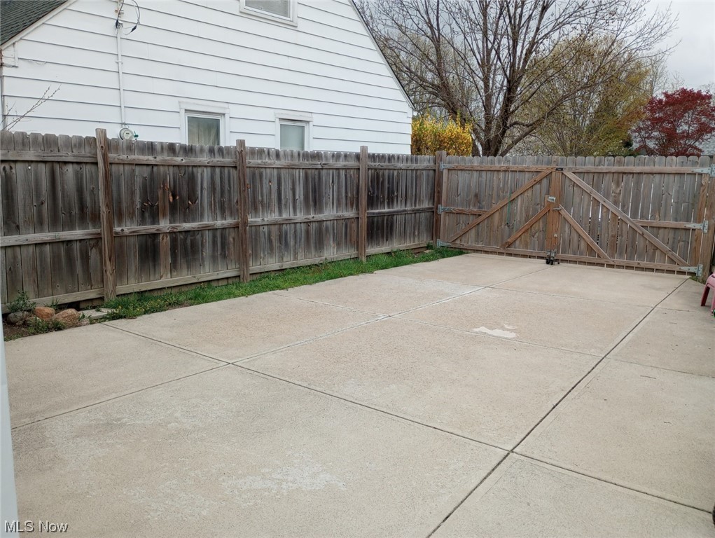 465 Babbitt Road Euclid, OH 44123 - Photo 26 of 28 Driveway surrounded by privacy fence