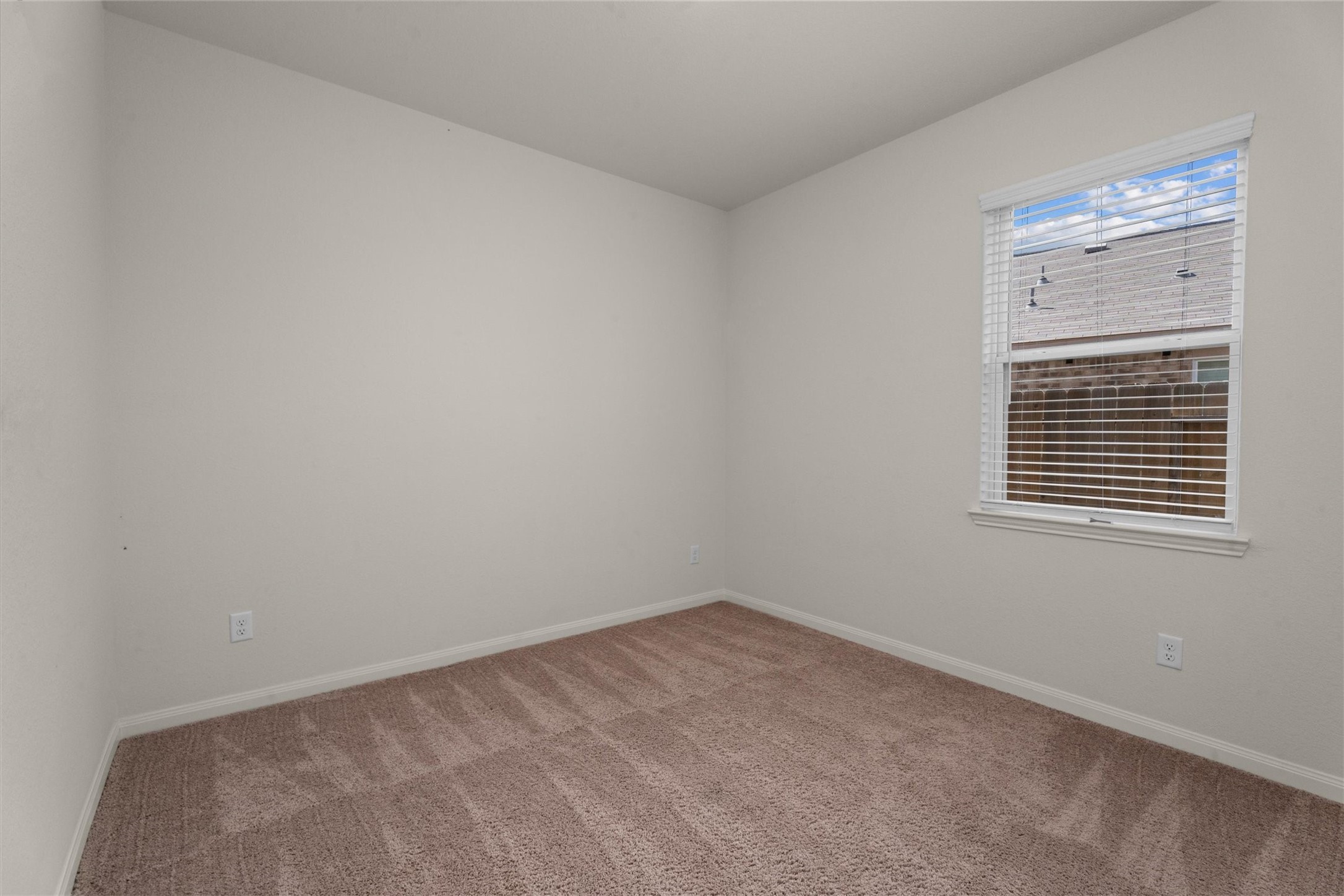 15215 Snowdrop Field Drive Humble, TX 77396 - Photo 18 of 35 an empty room with a window