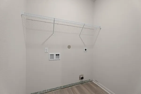 a view of a room with racks on the wall