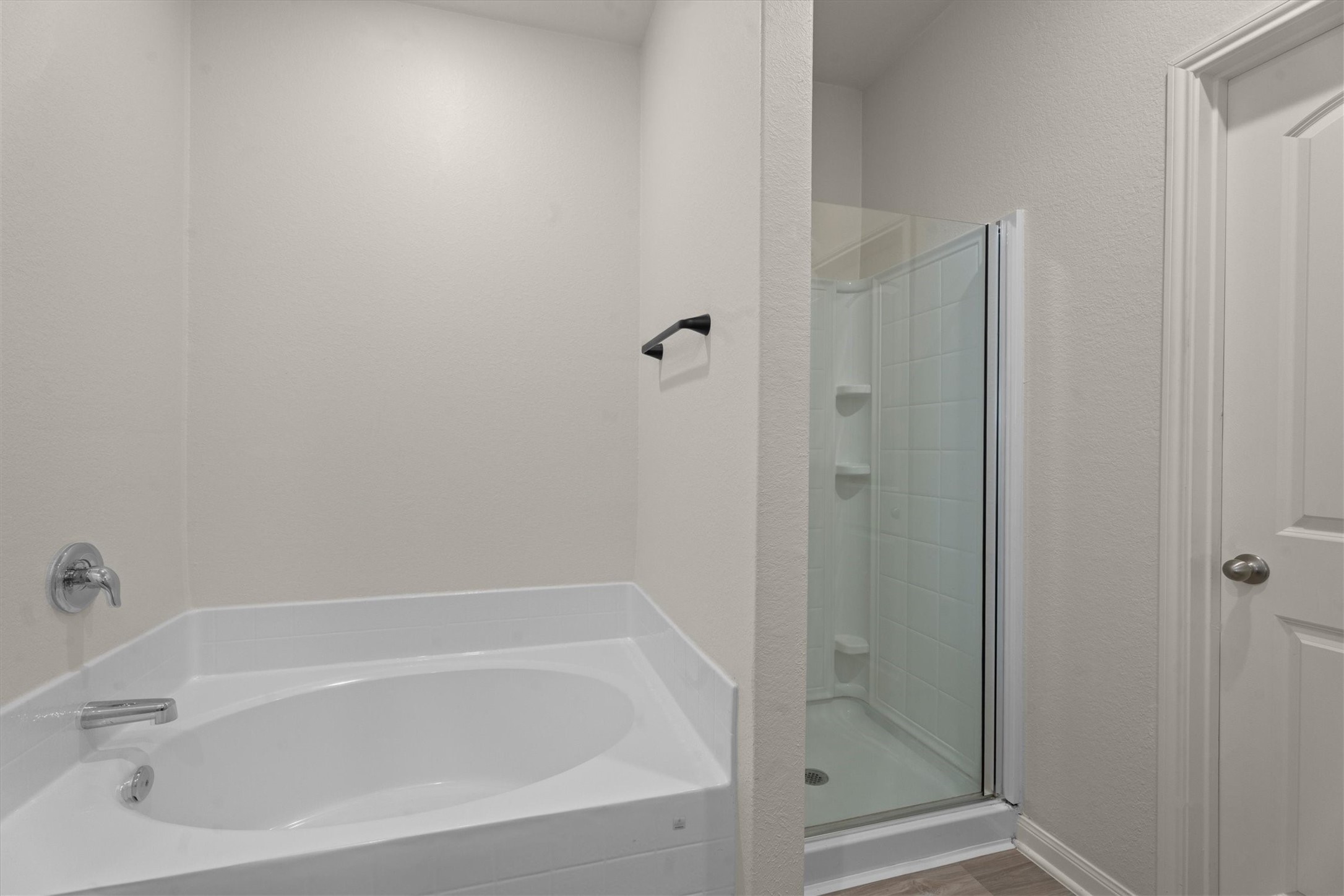 15215 Snowdrop Field Drive Humble, TX 77396 - Photo 28 of 35 a white bath tub sitting next to a shower