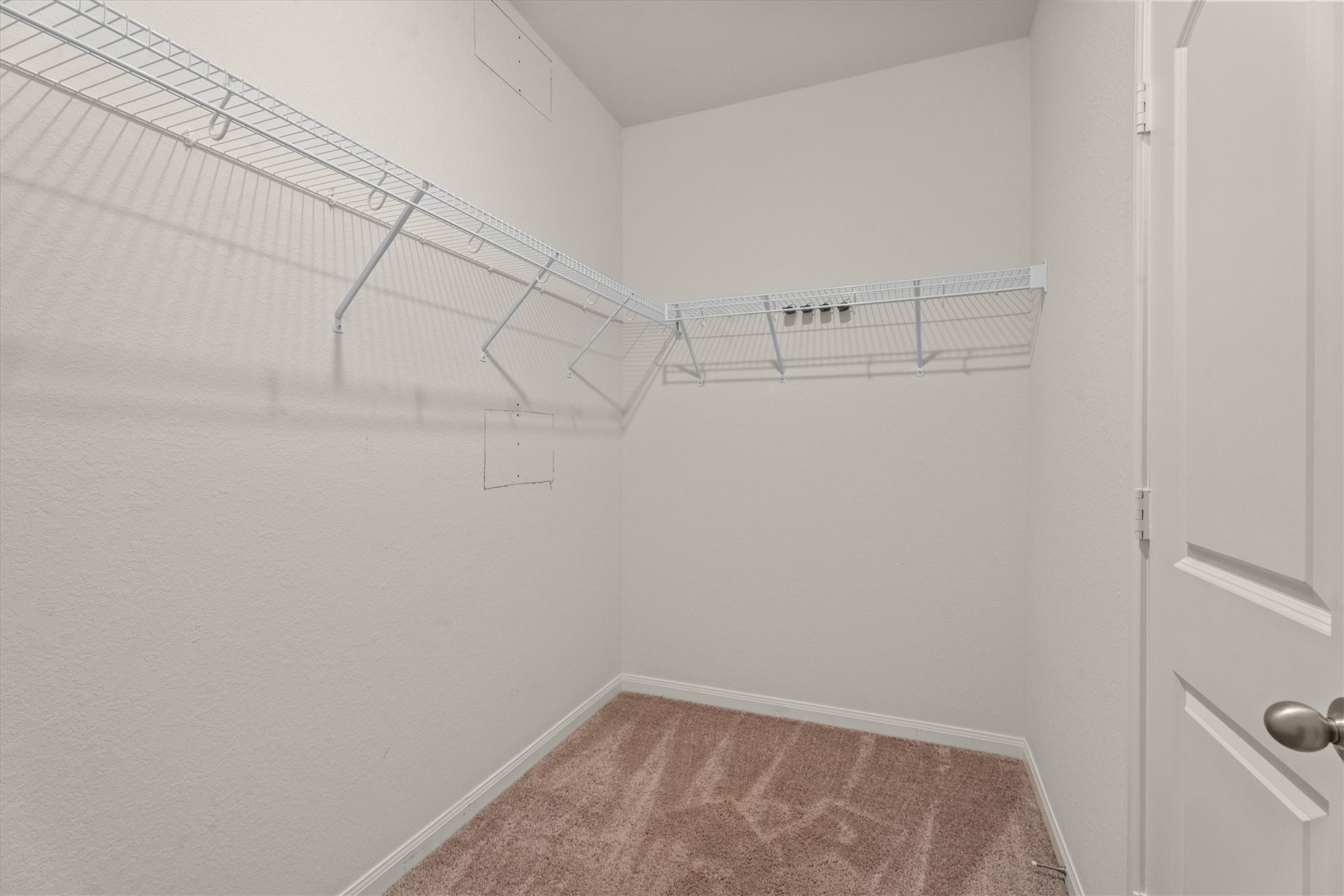 15215 Snowdrop Field Drive Humble, TX 77396 - Photo 29 of 35 a view of a room with racks on the wall