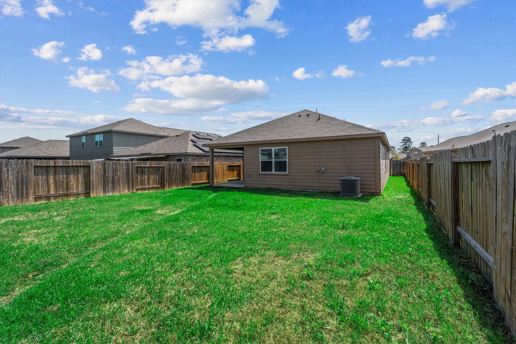 15215 Snowdrop Field Drive Humble, TX 77396 - Photo 34 of 35 a view of a house with wooden fence